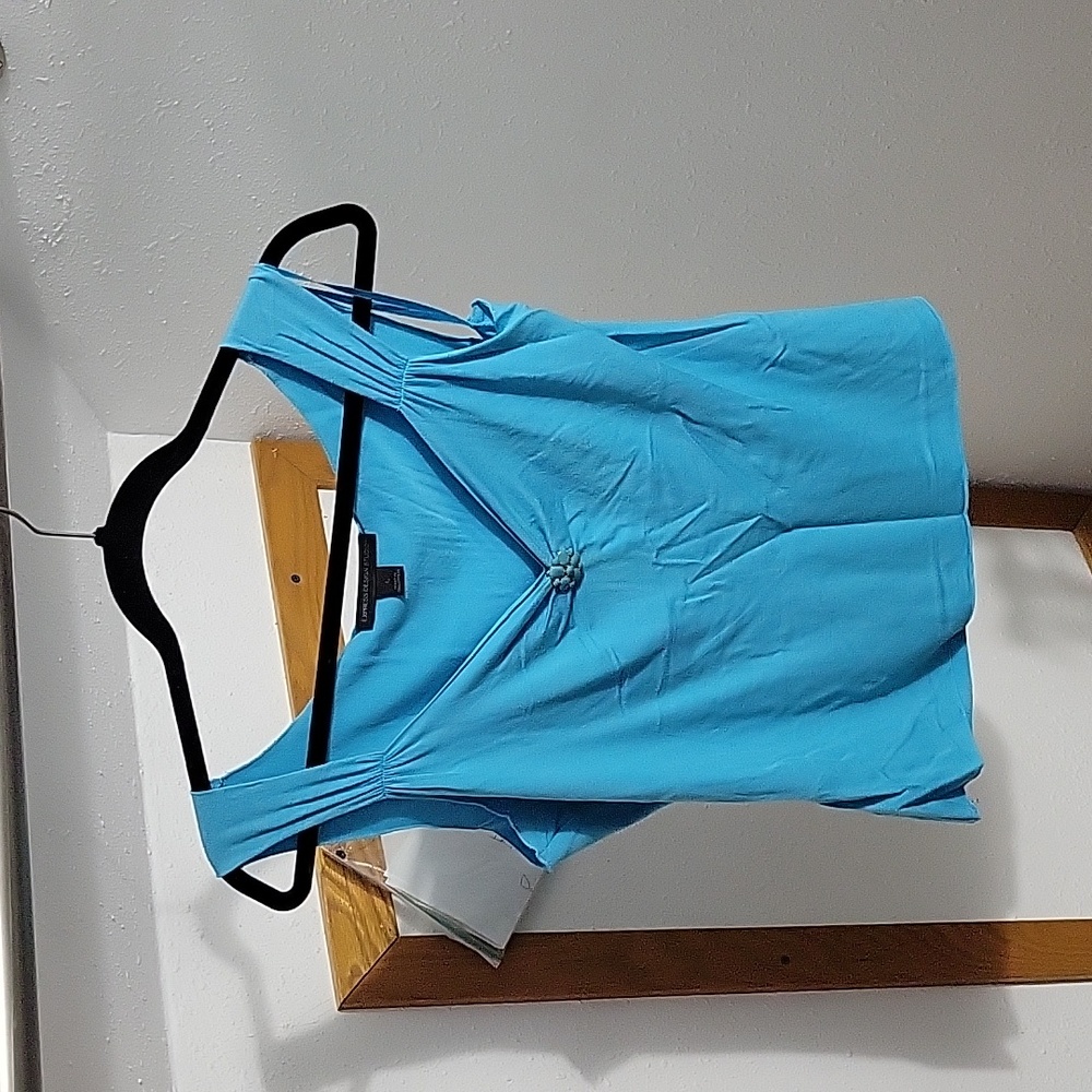 Bright blue vneck tank with brooch